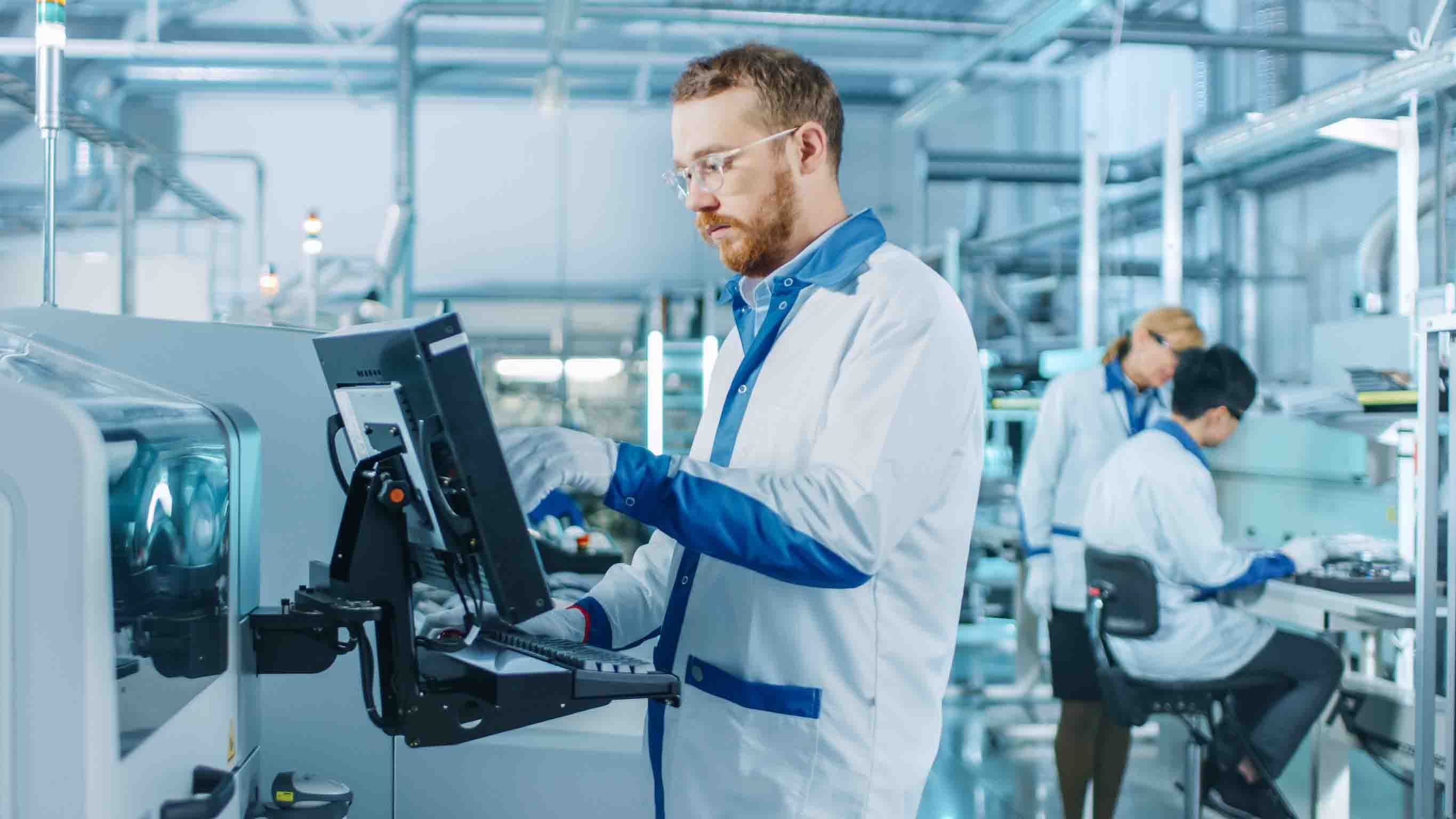man in a laboratory uses a Panel PC